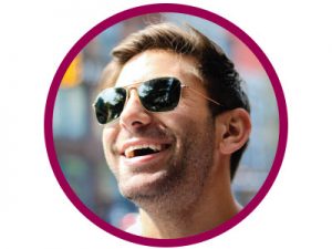 man smiling in sunglasses